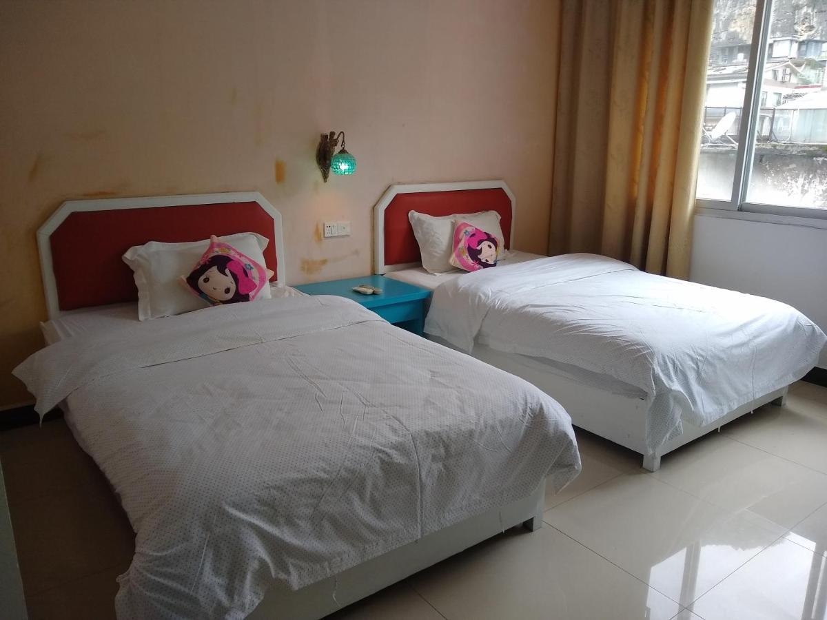 Yangshuo How Flowers Hostel מראה חיצוני תמונה