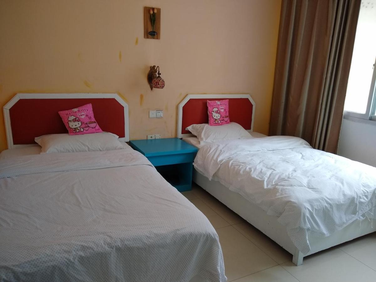 Yangshuo How Flowers Hostel מראה חיצוני תמונה