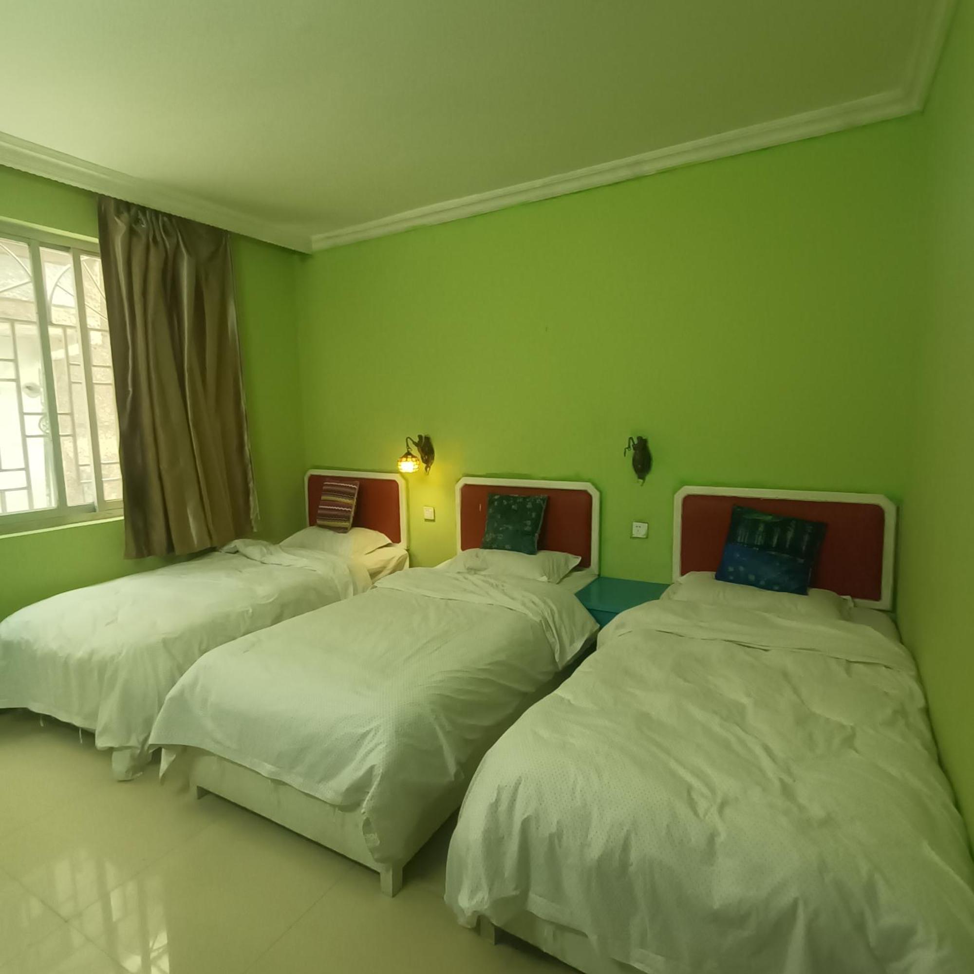 Yangshuo How Flowers Hostel מראה חיצוני תמונה