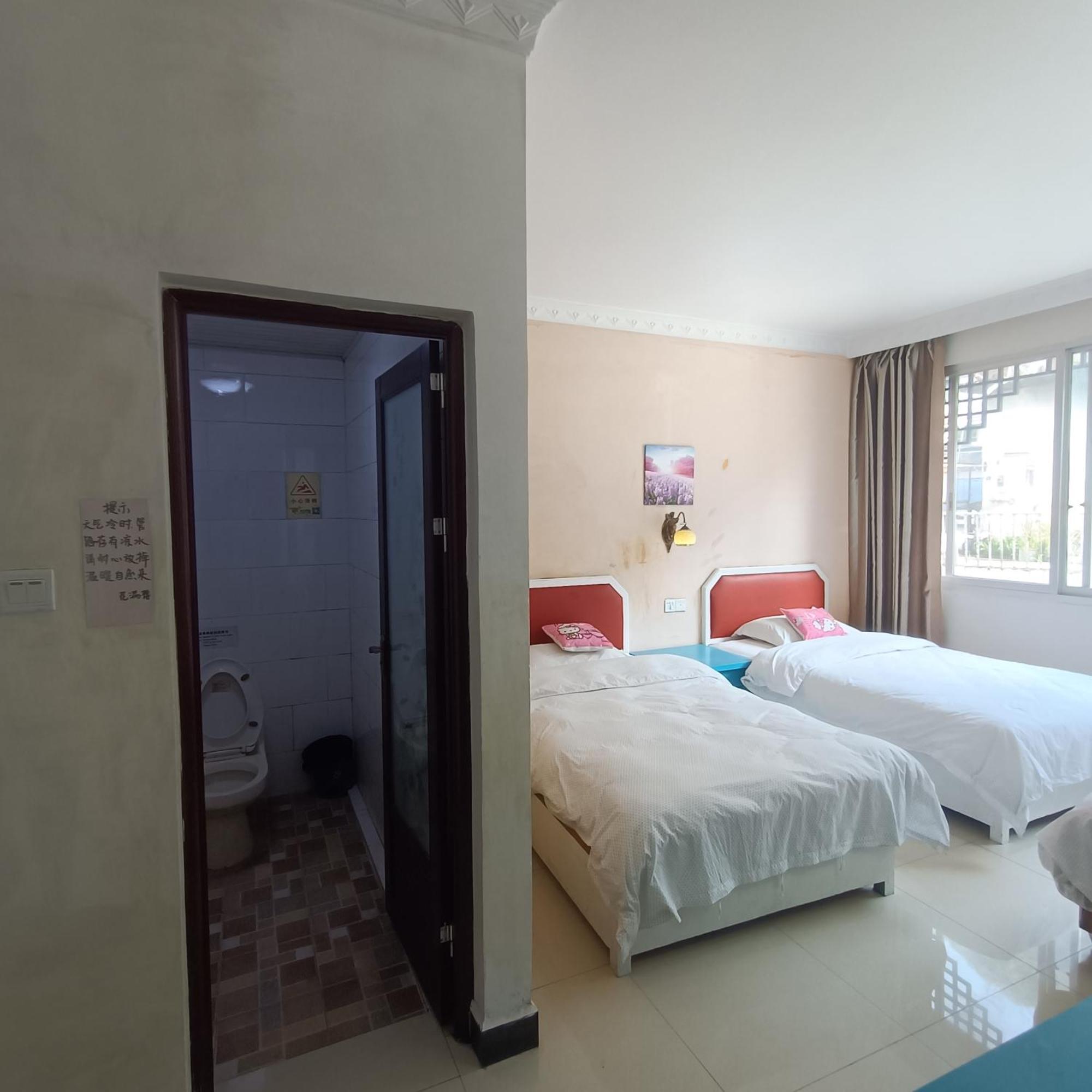 Yangshuo How Flowers Hostel מראה חיצוני תמונה