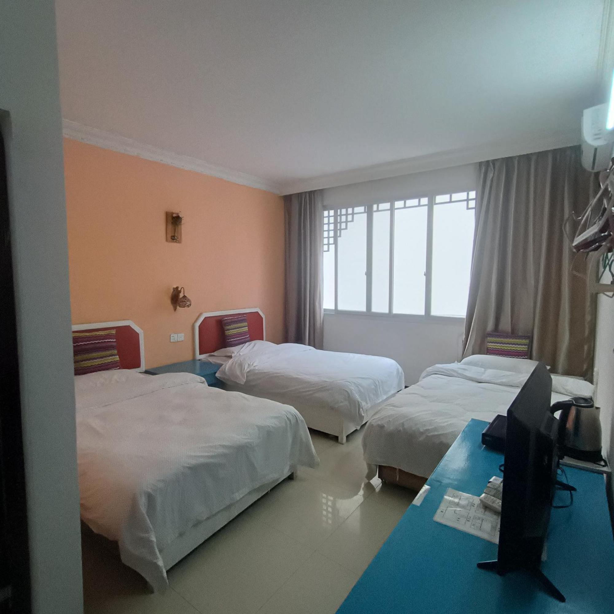 Yangshuo How Flowers Hostel מראה חיצוני תמונה