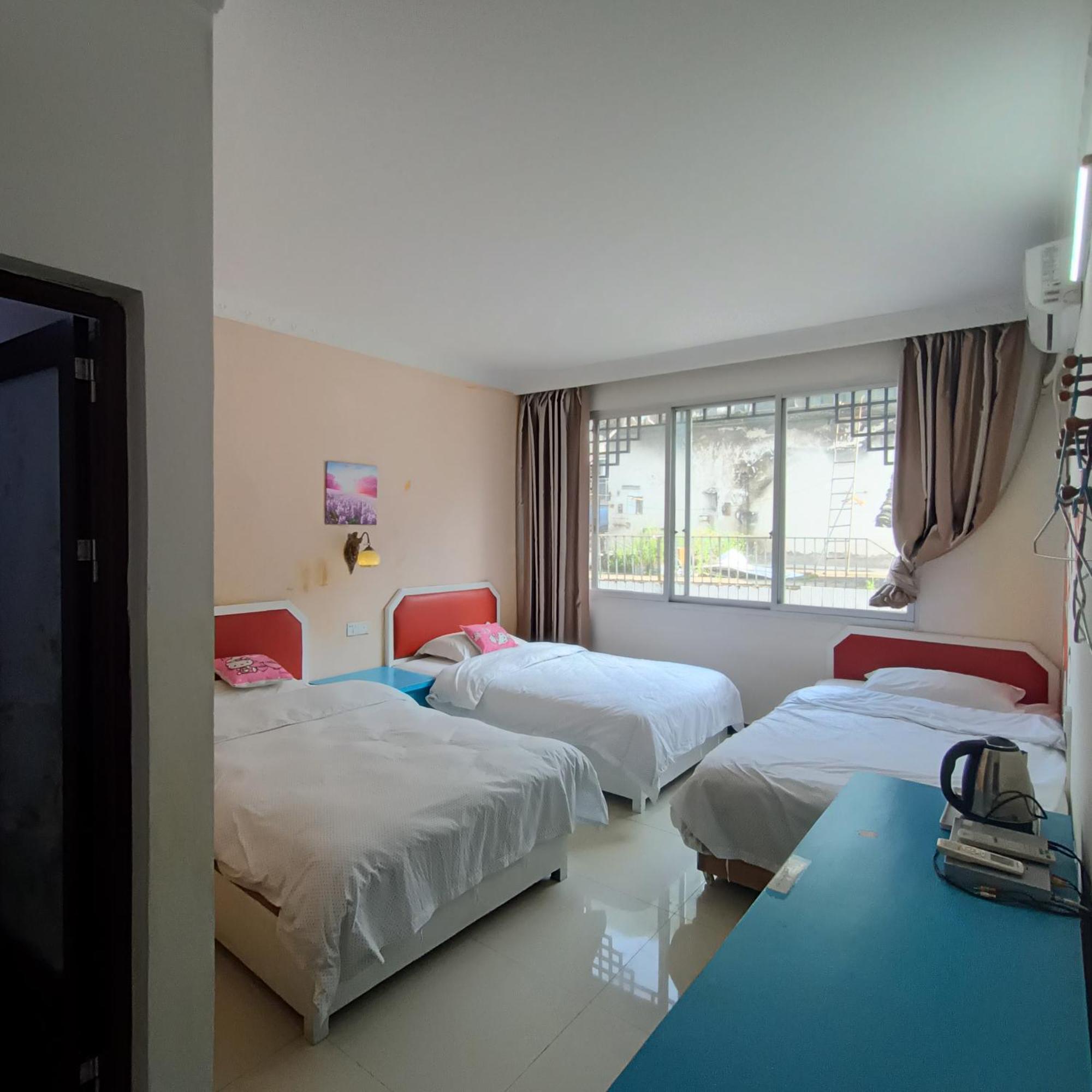 Yangshuo How Flowers Hostel מראה חיצוני תמונה
