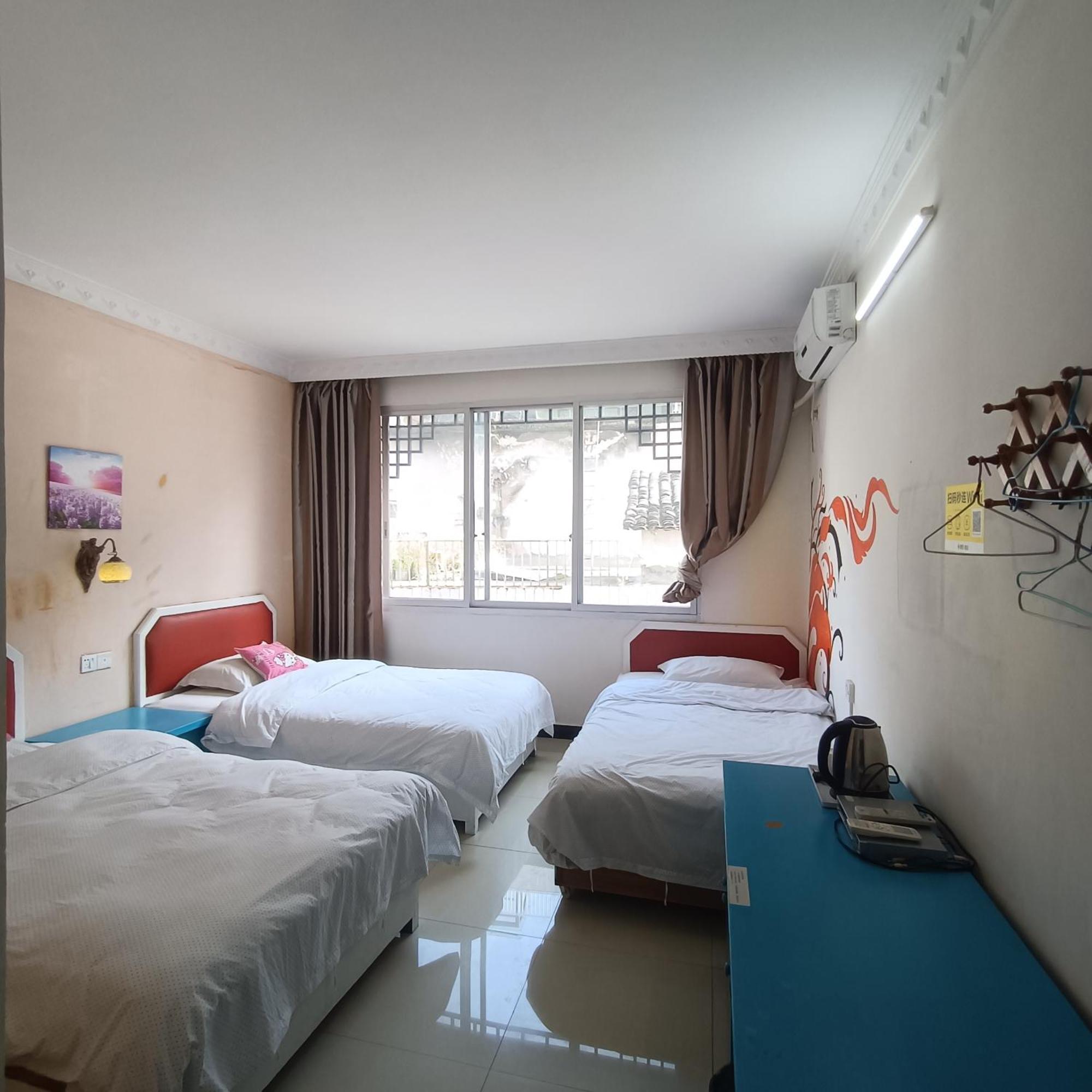 Yangshuo How Flowers Hostel מראה חיצוני תמונה
